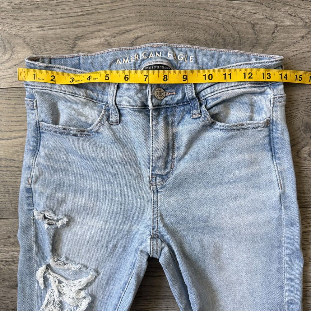 American Eagle Next Level Stretch Skinny Jeans Distressed Light Wash Size 0 Reg - Picture 4 of 8